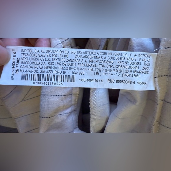 Zara Pleated Skort features a high waist, wrap front, side buckle, pleat details - Picture 14 of 16